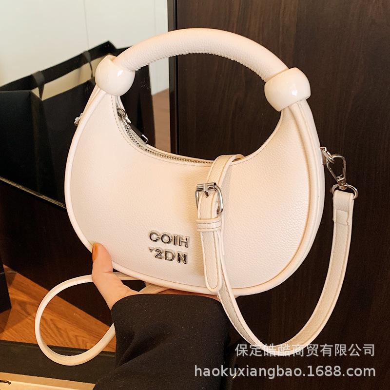 High sense niche bag women's summer 2025 new fashion messenger bag Korean version ins popular portable dumpling bag