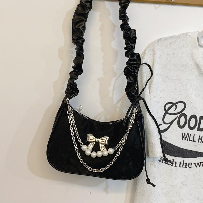 

Niche design single shoulder armpit bag women are popular this year 2025 new foreign style bow beautiful personalized crescent bag чорний