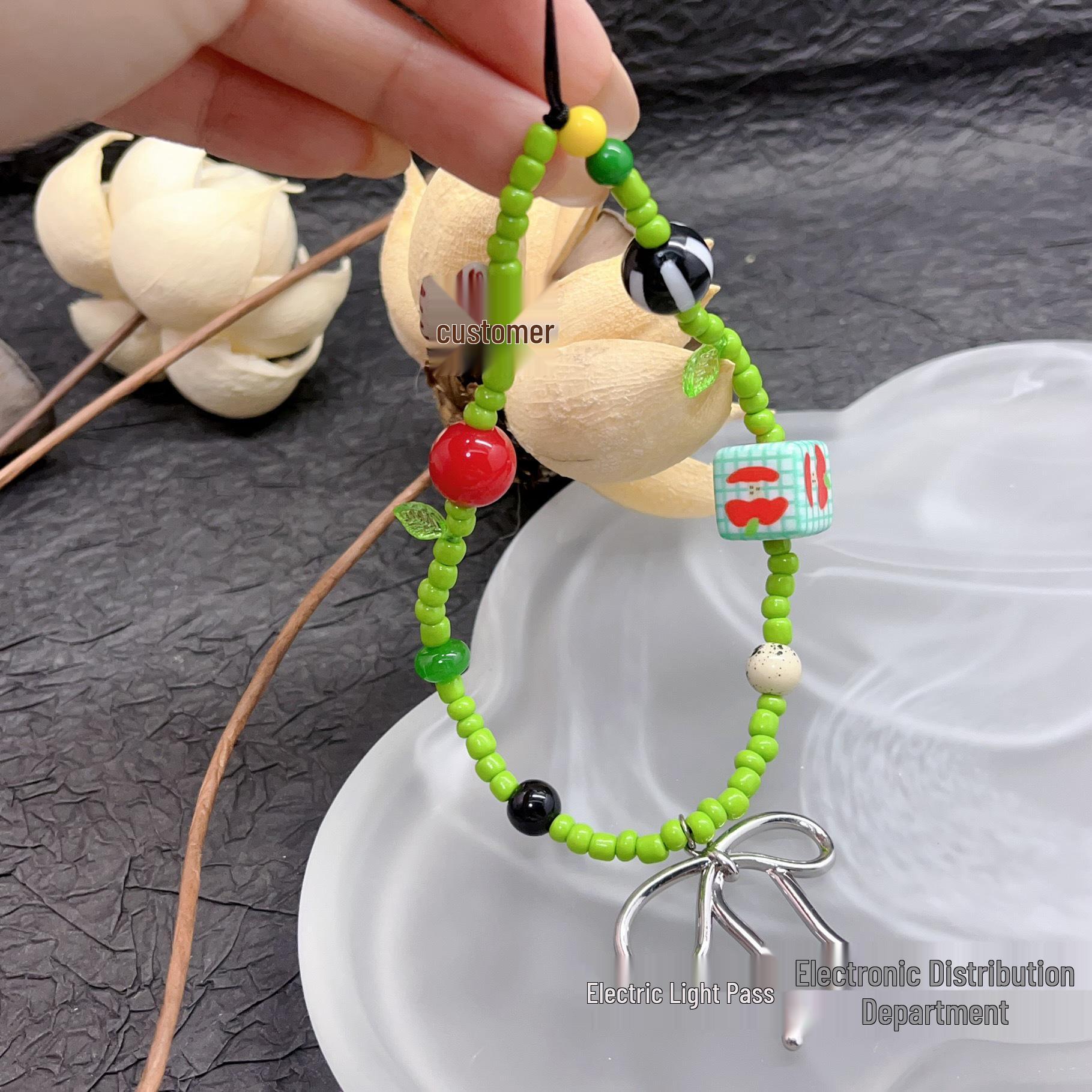 Trendy Green Bow Phone Charm: Handmade Beaded Strap & Camera Chain