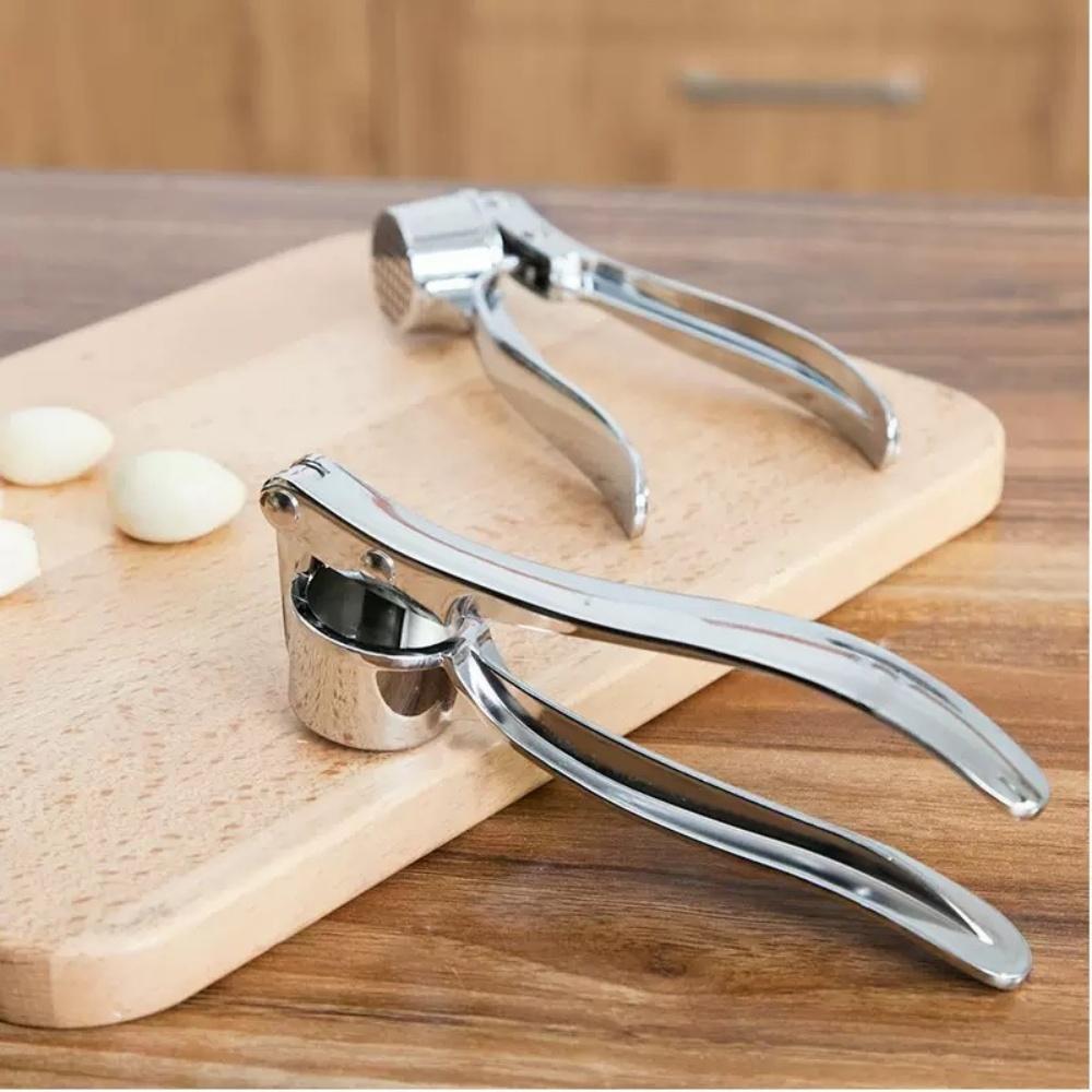 Stainless Steel Garlic Press Easy to squeeze and clean Professional kitchen tool Effortlessly crushes garlic Garlic crusher
