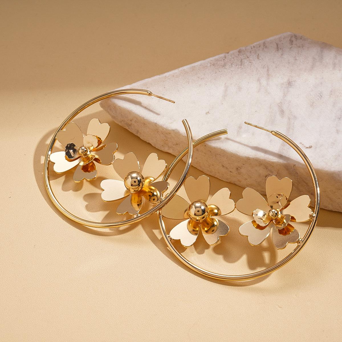 Metal geometric round flower silver needle earrings personalized fashion temperament earrings