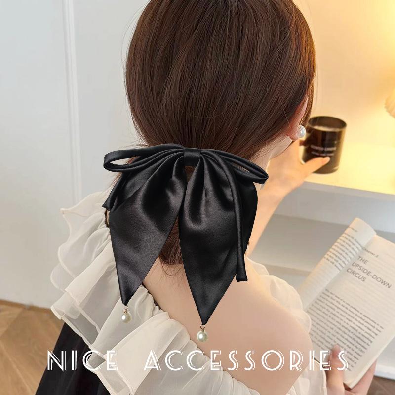 

Falling Goose 2024 Black Mermaid Bow Hair Clip