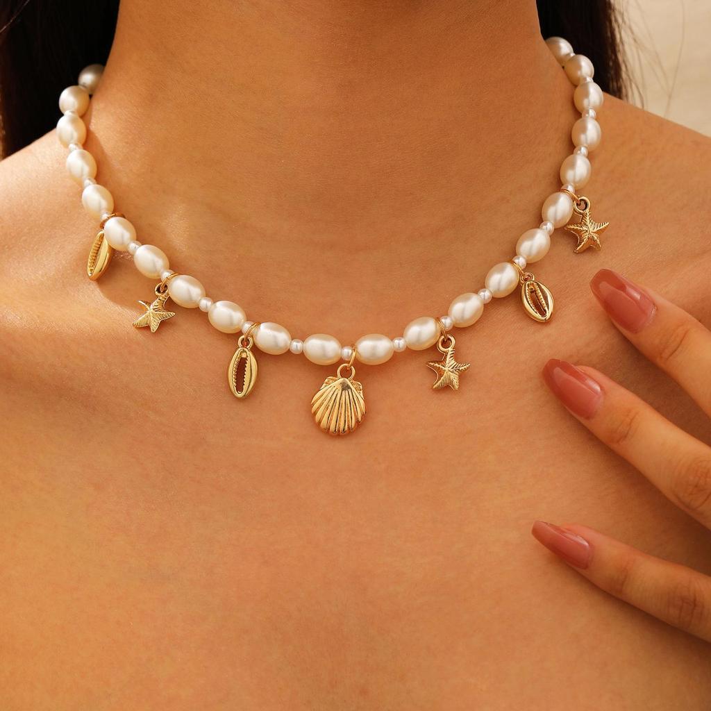 Set Collana e Bracciale Estivo Bohemien con Stella Marina, Conchiglia e Perle