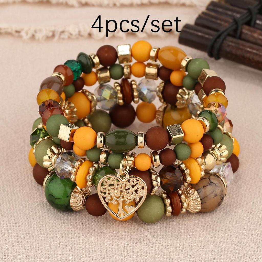 Bohemian Multi-Layer Tassel Bracelet Set with Hollow Heart Pendants and Glass Beads.