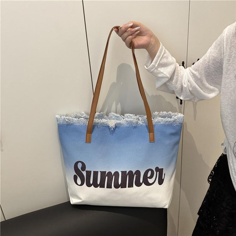 New large-capacity fringed bag beach bag women's shoulder tote bag is now popular casual bag popular women