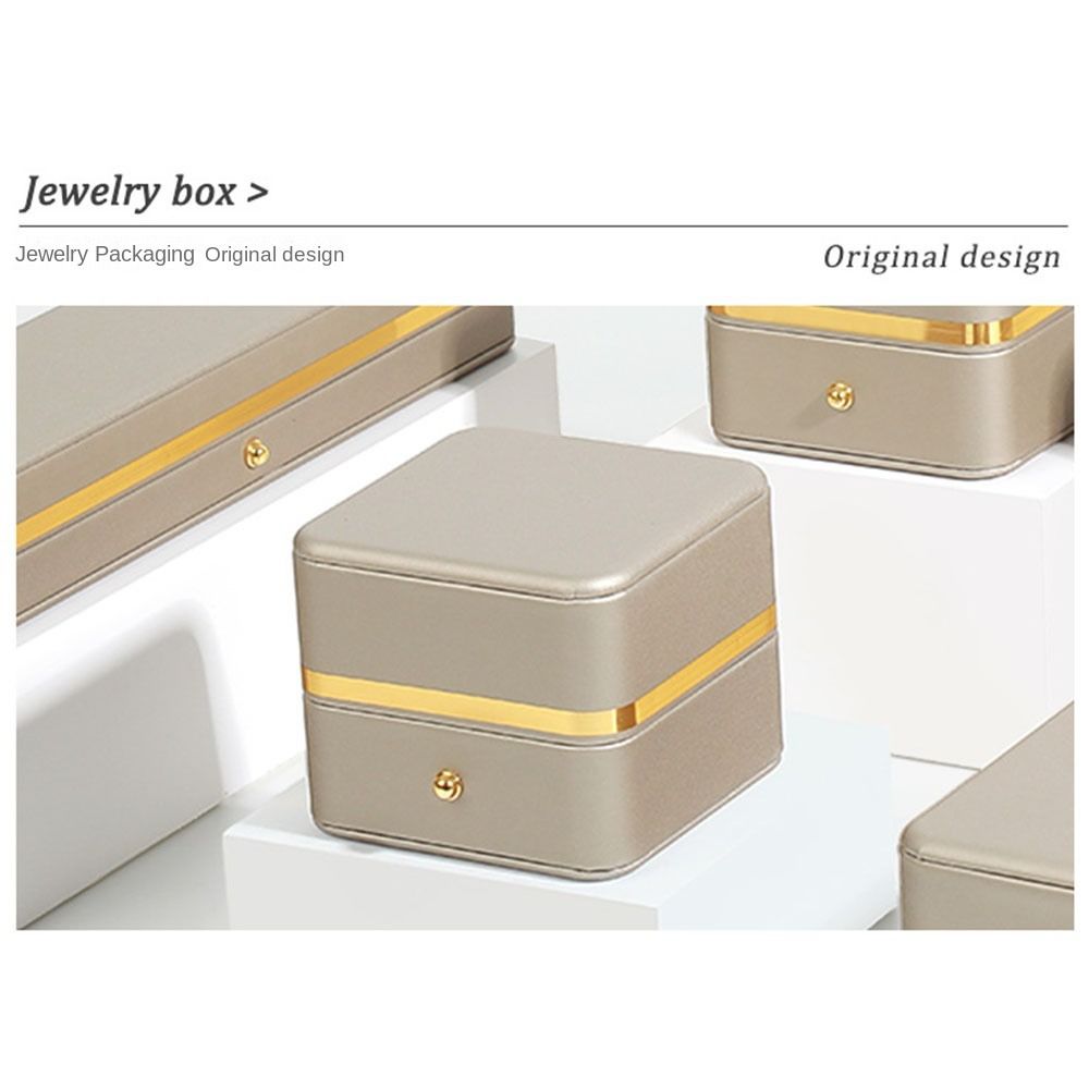 Elegantes Ringaufbewahrungsetui PU-Leder Ring-Präsentationsboxen Mode Quadratische Ringbox Hochzeit