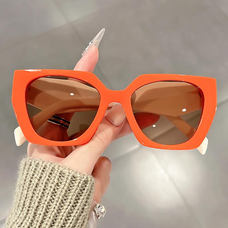 

Square-framed versatile sunglasses with unique diamond-shaped legs are fashionable and trendy travel photography accessories