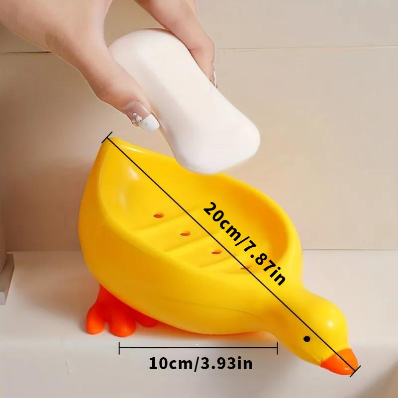 

Объединение дренажа и хранения: Мыльница в форме утки с пластиковым дренажным поддоном и самоотливным кронштейном