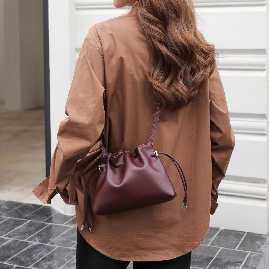 Cowhide Ruched Cloud Drawstring Bucket Bag - Soft Leather Crossbody Shoulder Bag for Women 2025.