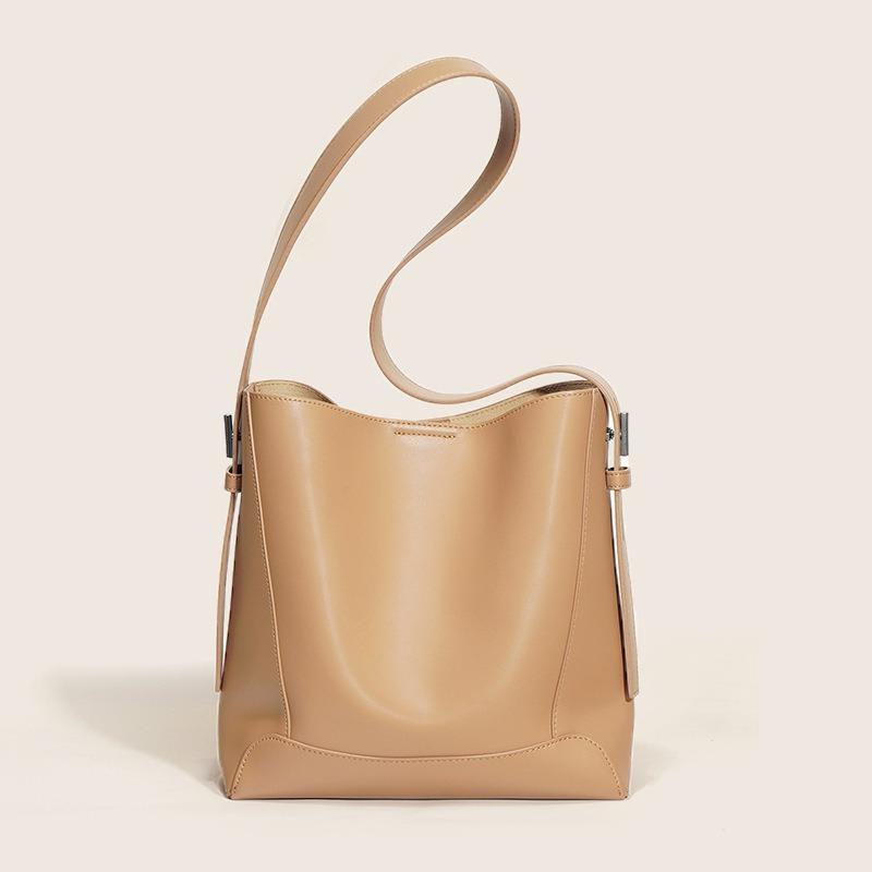 Cowhide bag women's versatile commuter bucket bag new leather women's bag high-end niche design shoulder bag