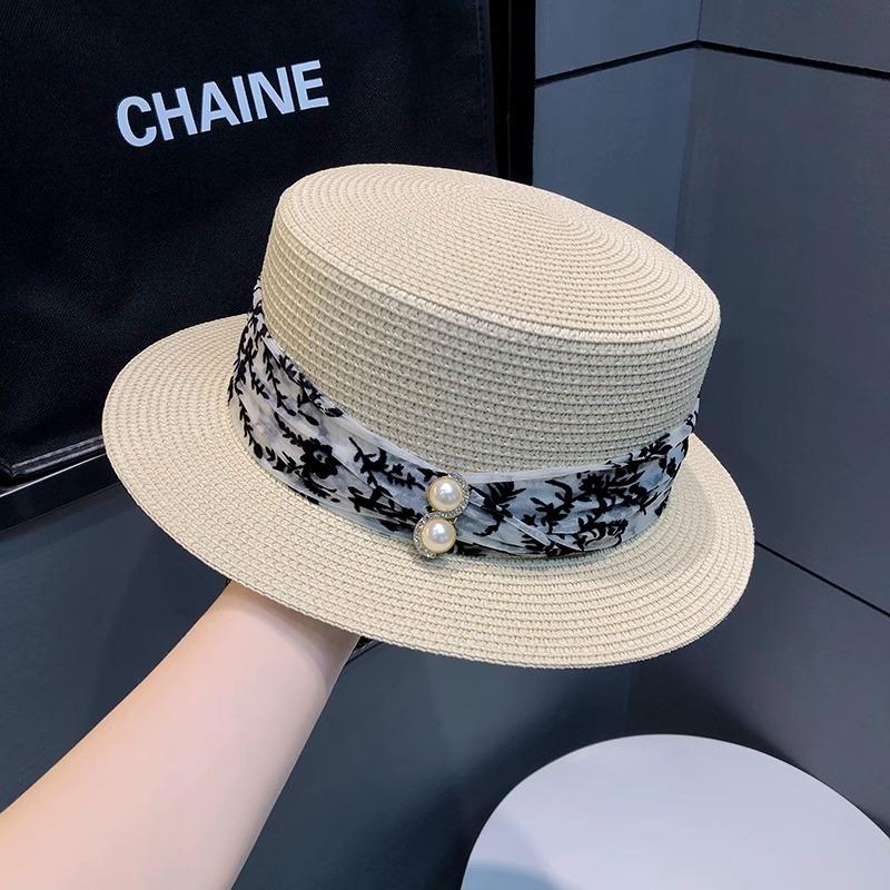 Straw hat women's summer beach seaside vacation sunshade sunscreen hat straw temperament flat top top hat new sun hat