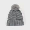 European & American Style Warm Woolen Knit Hat for Women with Ear Protection