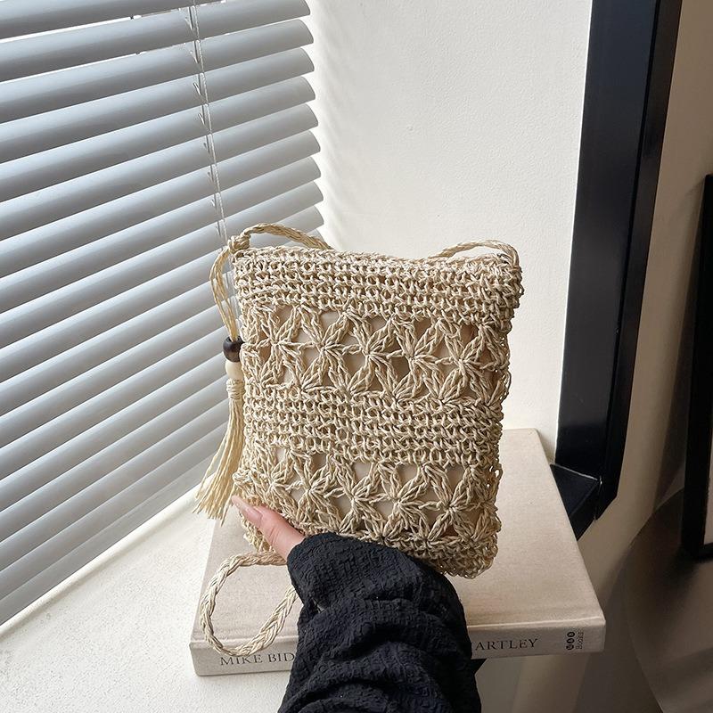 

Tassel woven bucket bag women s summer new high-end niche high-end messenger shoulder bag
