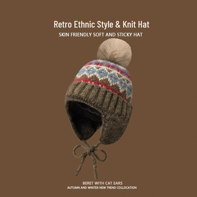 Kawanishi Women's Handmade Wool Beanie with Tassel and Ear Protection