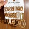 Boucles d'Oreilles Créoles Lisses Torsadées - Design Rétro, Finition Haut de Gamme, Style Niche Riz Sept Grains