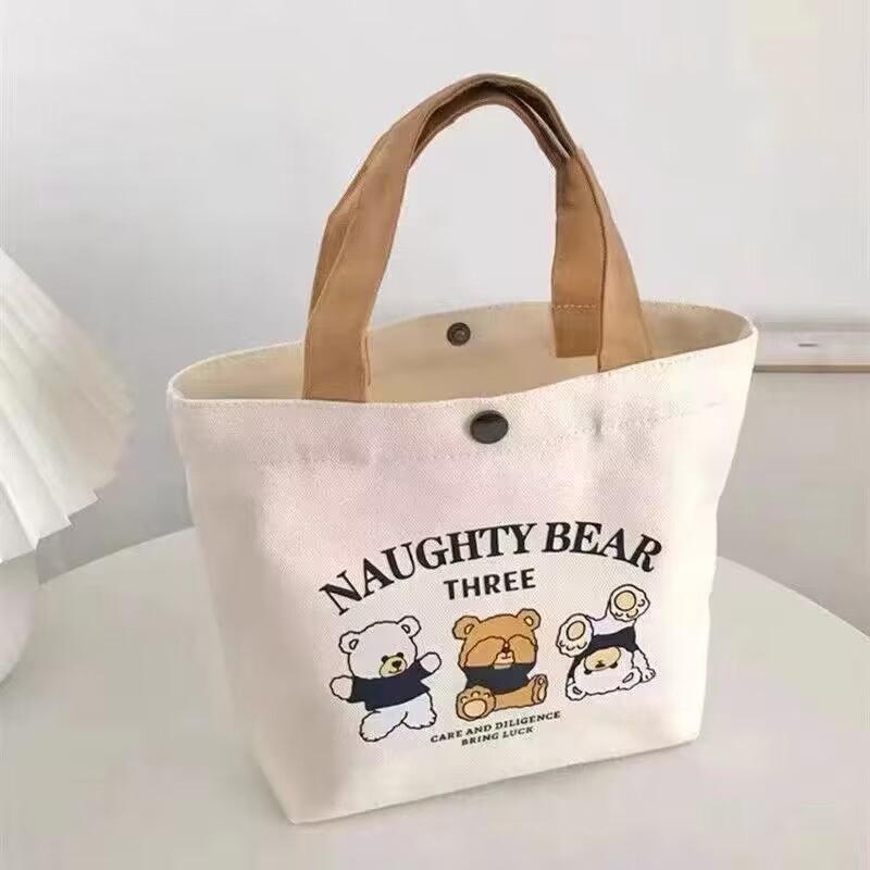 

Cute Bear Small Versatile Handbag Mini Canvas Bag Female Student Lunch Box Bag Simple Tote Bag Office Worker Lunch Bag