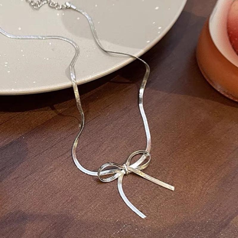 

Stainless Steel New Fashion Waterproof Bow Necklace for Women Snake Bone Chain Bowknot Charm Necklaces Silver Color Jewelry