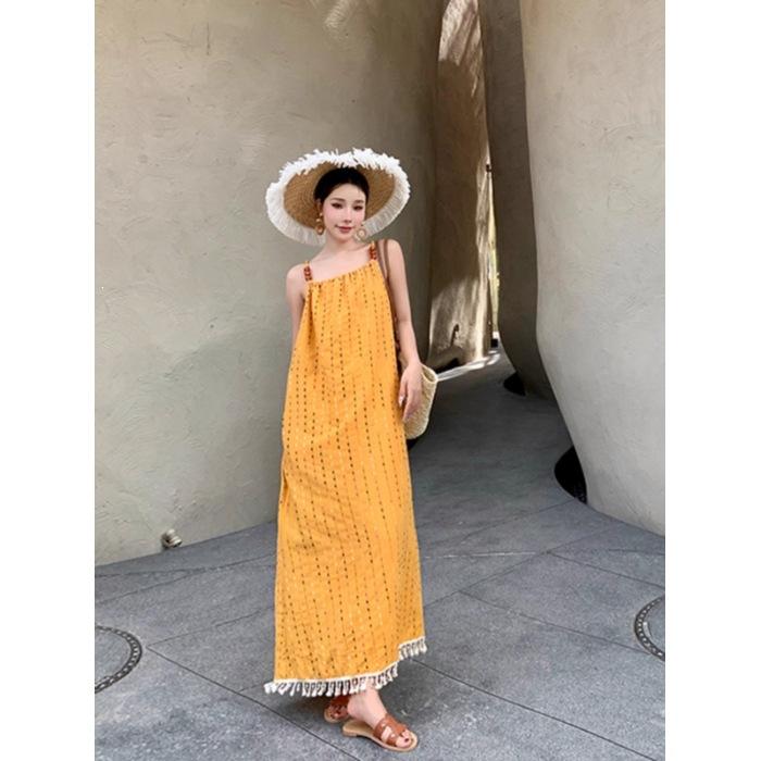 Seaside vacation style summer new dress women's clothing design sense loose yellow fringed suspender medium and long dress