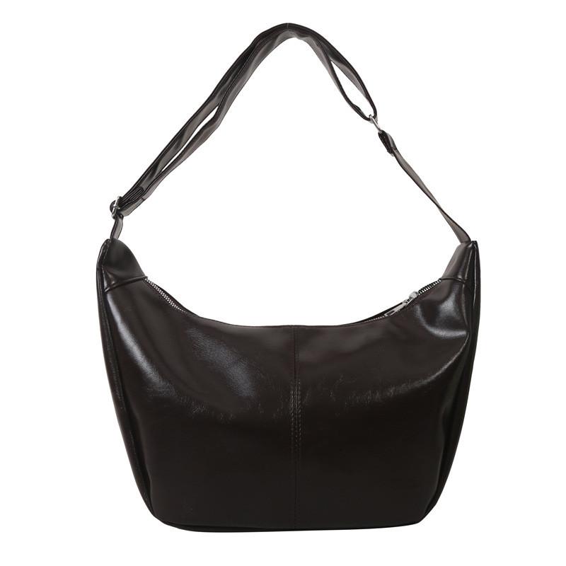 Fashionable Retro Medium Sized Crossbody Bag With Soft Structure And Unique Stitching Details