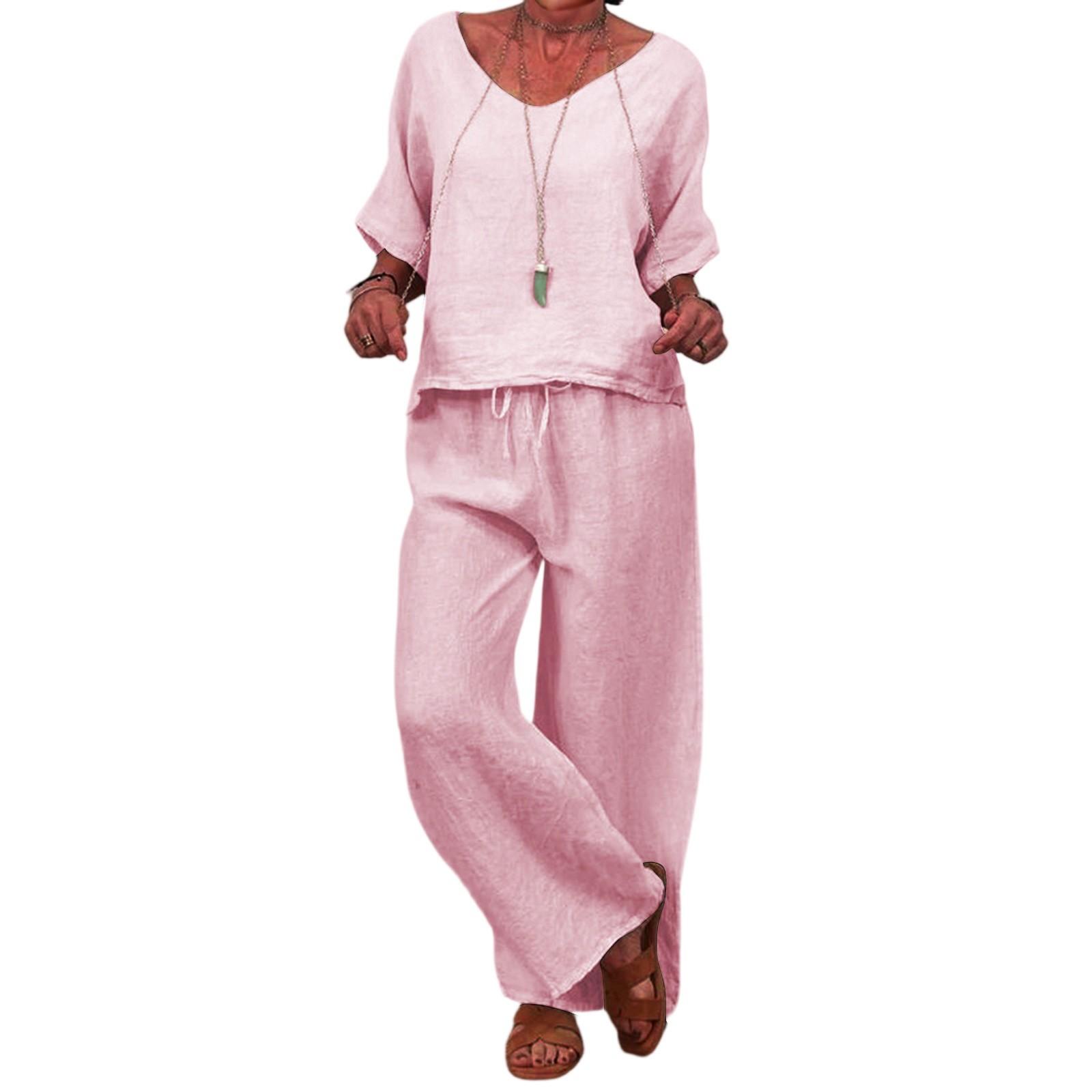 

Жіночий повсякденний комплект з довгими штанами широкого крою, з рукавом середньої довжини та низьким круглим вирізом. M рожевий