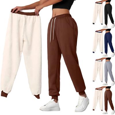 Modne, casualowe spodnie dresowe damskie z pogrubionymi kieszeniami i ściągaczem dla ciepła