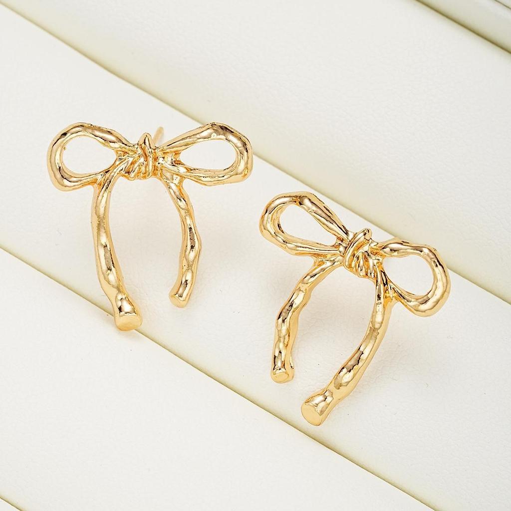 New hollow bow stud earrings women's versatile simple fashion personalized earrings simple retro butterfly earrings