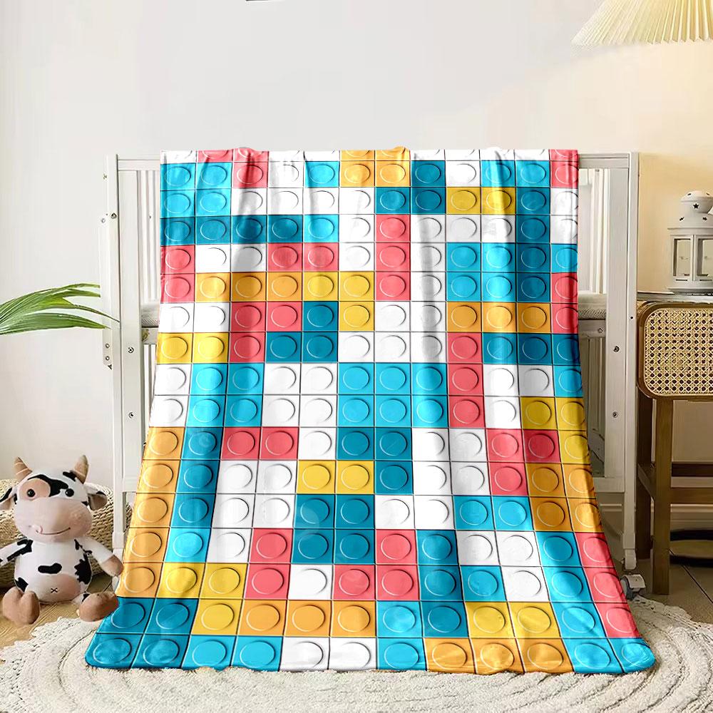 The pattern consists of colorful square tiles with circular indents. for all seasons blanket lunch break throw gift 80cm x 120cm