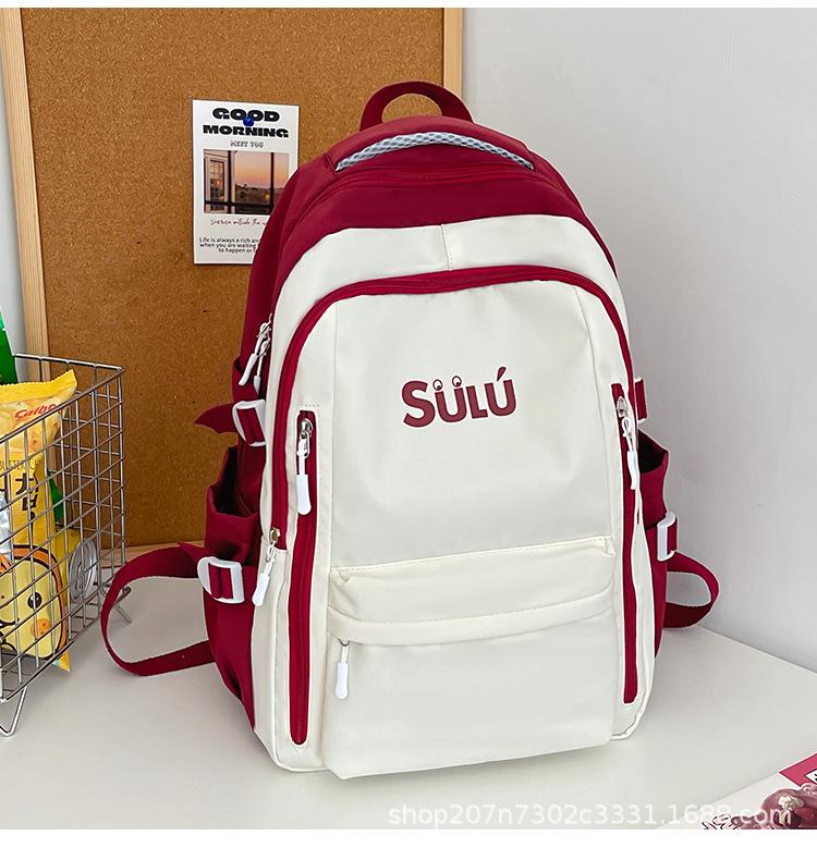 Schoolbag schoolbag female ins high value large capacity junior high school student backpack Japanese simple contrasting color backpack wholesale