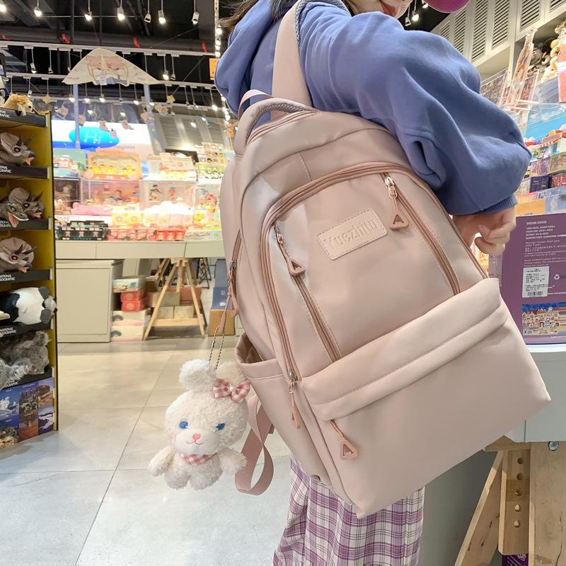 Small Fresh College Style Ins Vertical Zipper Model Labeled Student Schoolbag 2023 Large Capacity Junior High School Student Backpack