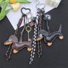 Leather Cartoon Dachshund Keychain with Woven Rope Pendant