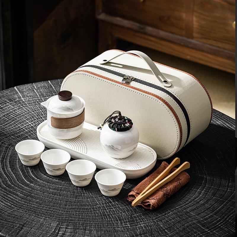 Yangzhiyu ceramic travel tea set: one pot, three cups, Kuaike cup, outdoor travel exquisite small set, single-person drinking tea set