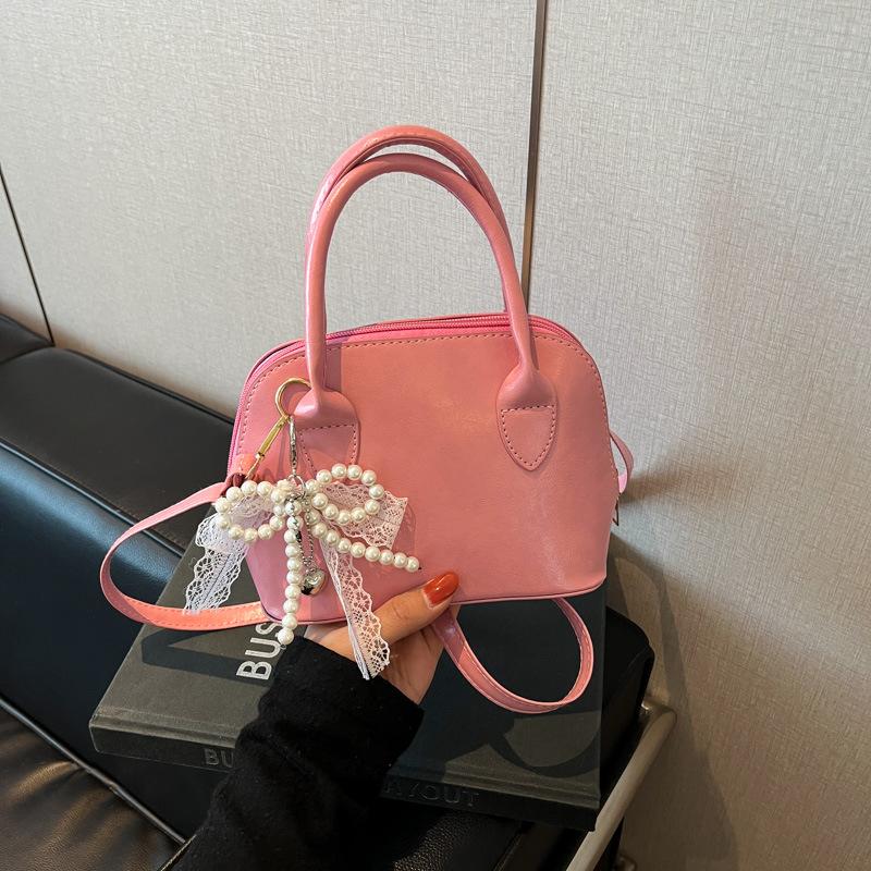 Korean Niche Fashionable Portable Shell Bag Women's 2025 Spring New Foreign Style High Value Single Shoulder Messenger Bag