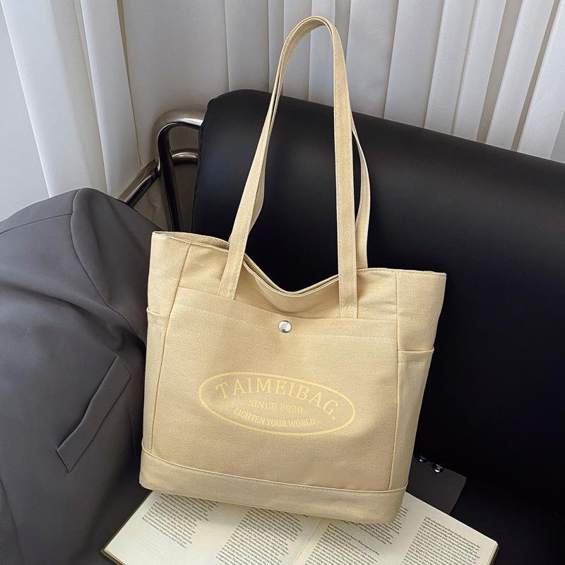 

Large-capacity tote canvas bag 2025 new high-value commuting versatile bento mommy bag shoulder cloth bag bag хакі