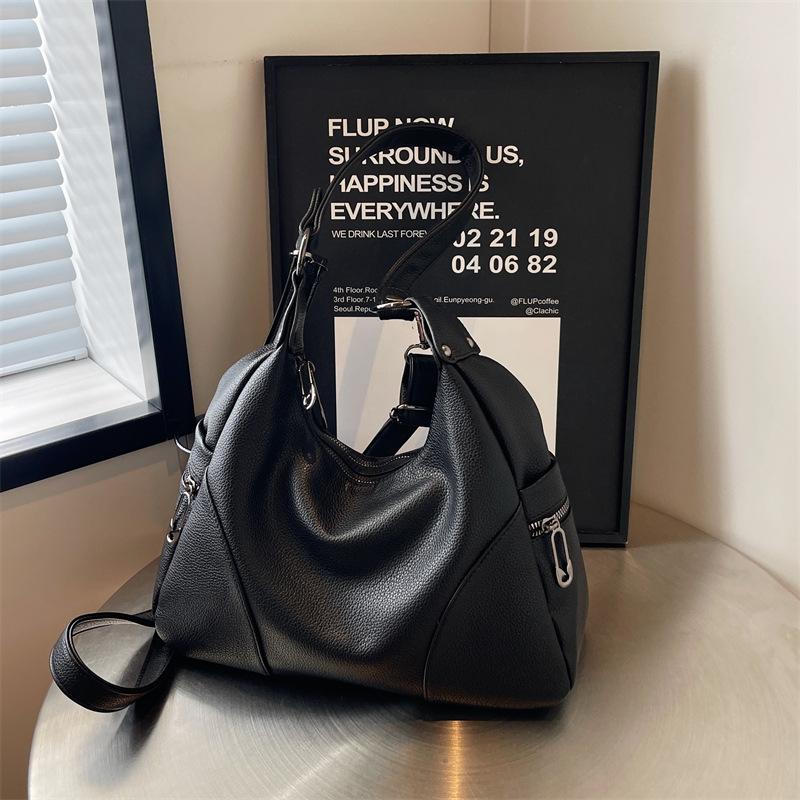 

Lychee pattern cowhide women s bags, women s large-capacity messenger bags, women s exquisite portable shoulder bags, commuting to work чорний