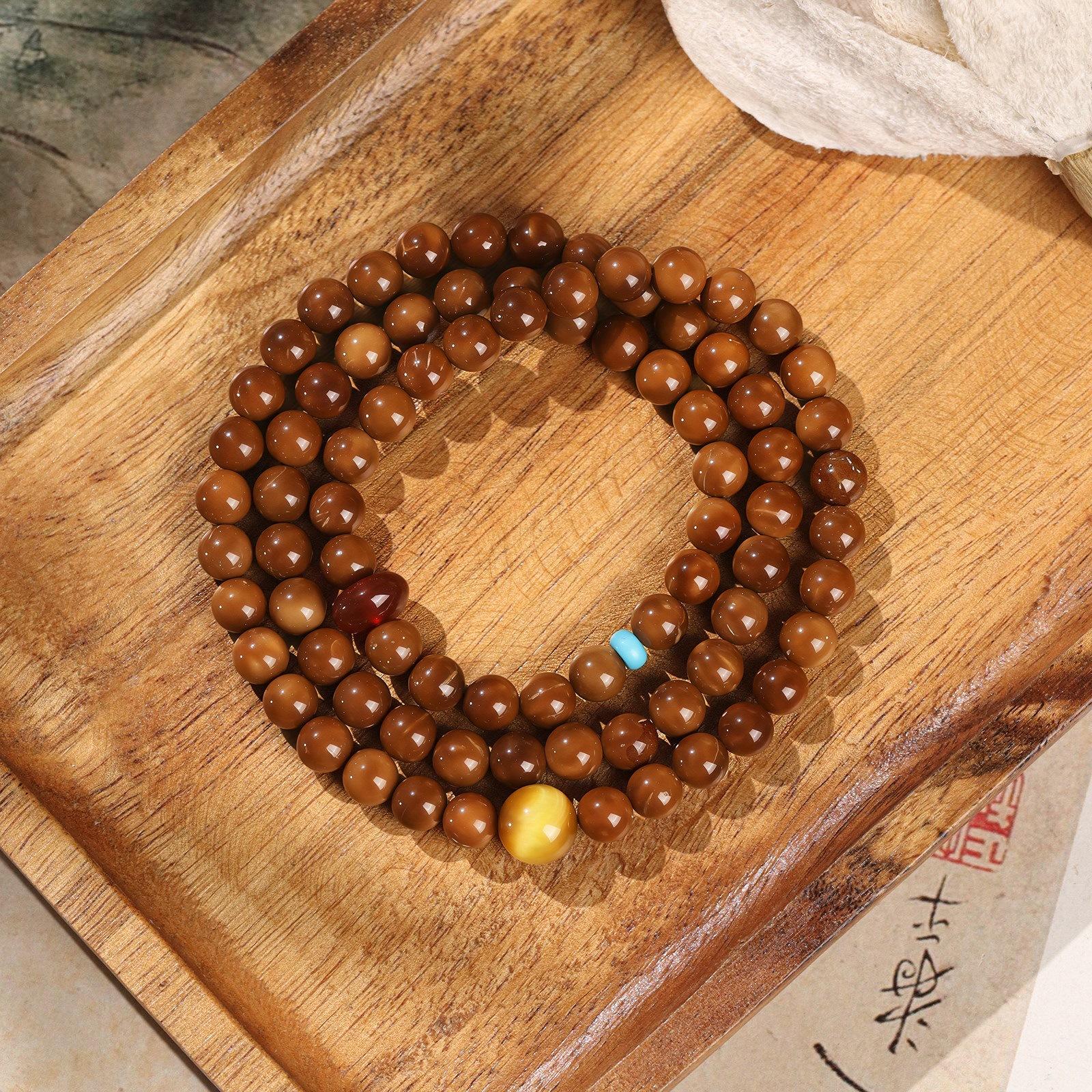 Exquisite and unique three-loop natural brown sequin bracelet, new Chinese-style women s bracelet for stacking Three-strand natural Kuk