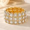 Stretch Bracelet with Repeating Figure-8 Links, Gold-Tone Zinc Alloy Design and Clear Decorative Rhinestones Details