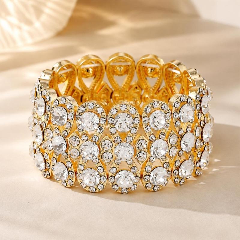 Stretch Bracelet with Repeating Figure-8 Links, Gold-Tone Zinc Alloy Design and Clear Decorative Rhinestones Details