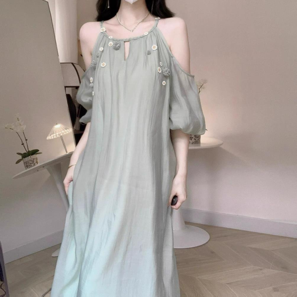 French cold feeling small daisy off-the-shoulder suspender dress women's summer new temperament socialite style loose medium and long dress