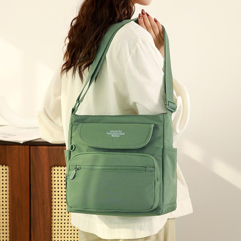 Stylish Crossbody Bag with Front Flap and Multiple Pockets for Everyday Use