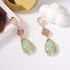 Light luxury, high-end sense, fashionable and fresh jelly color, water drop long color alloy mesh pocket, resin earrings, earrings.