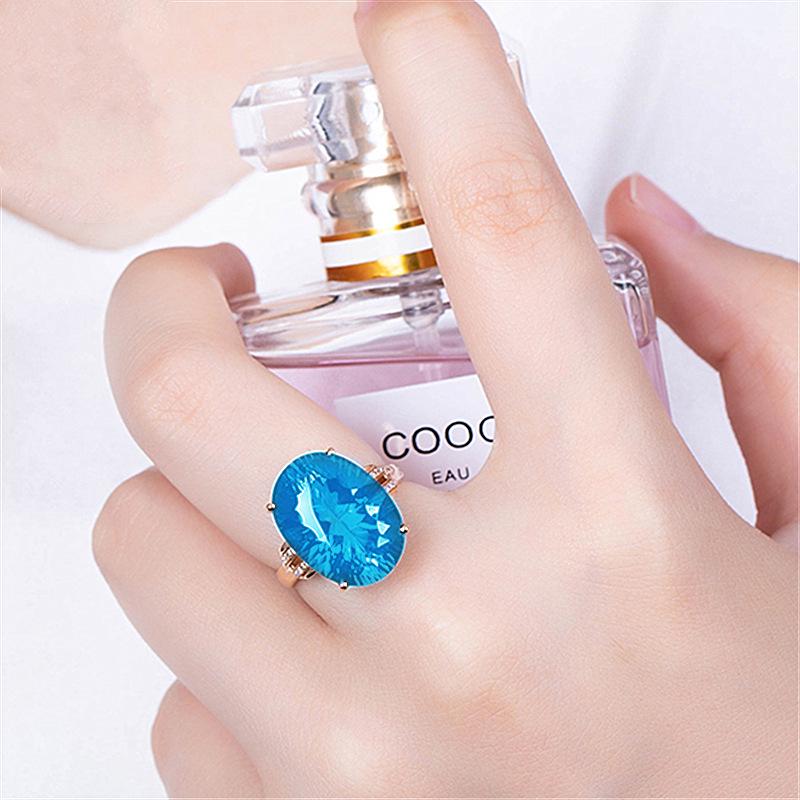 Roségoldplattierter Aquamarin- und Topas-Offener Ring mit ovalen, diamantbesetzten Farbsteinen