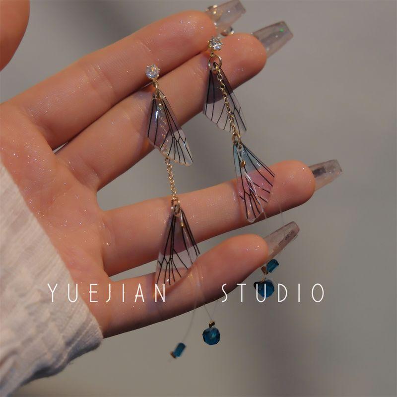

Yuejian Awakening ~ New Chinese Butterfly Wings Crystal Super Mori Long Stud Earrings Mosquito Coil Ear Clip Pair of blue ear needles