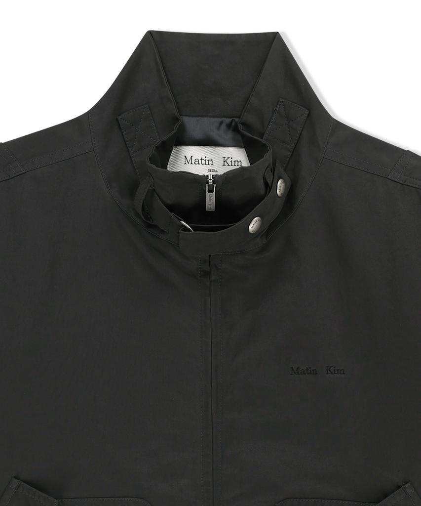 MATIN KIM Buckle High Neck Utility Jumper In Charcoal