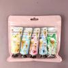 Weihnachts-Handcreme-Geschenkset 5 Teile Feuchtigkeitsspendende Mini-Reiselotion für Damen Herren Weihnachtsstrumpffüller Weihnachtsfeier-Mitbringsel