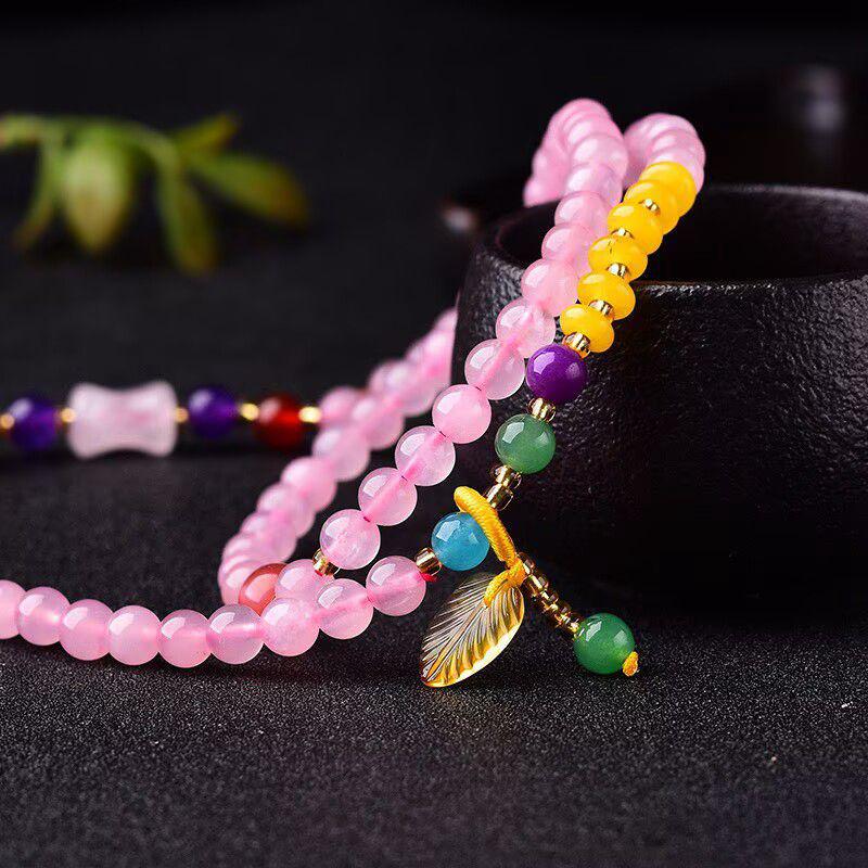 

Pink Crystal Bracelet with Amber Pendant for Romance and Prosperity