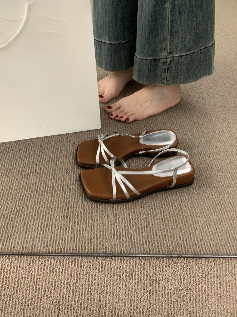 

Retro versatile open-toed sandals women s summer wear 2025 new models are not tired of feet thick-soled casual beach Roman shoes 40