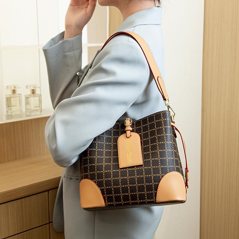 Niche luxury women's handbag, high-end bucket bag, 2026 new vintage fashion versatile crossbody bag, internet celebrity hot item
