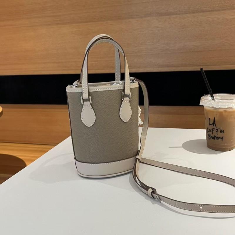

Factory TC First-layer Cowhide One-shoulder Crossbody Bag Color-matching Bucket All-match Commuting Length: 13 height: 18 width: 9 cm