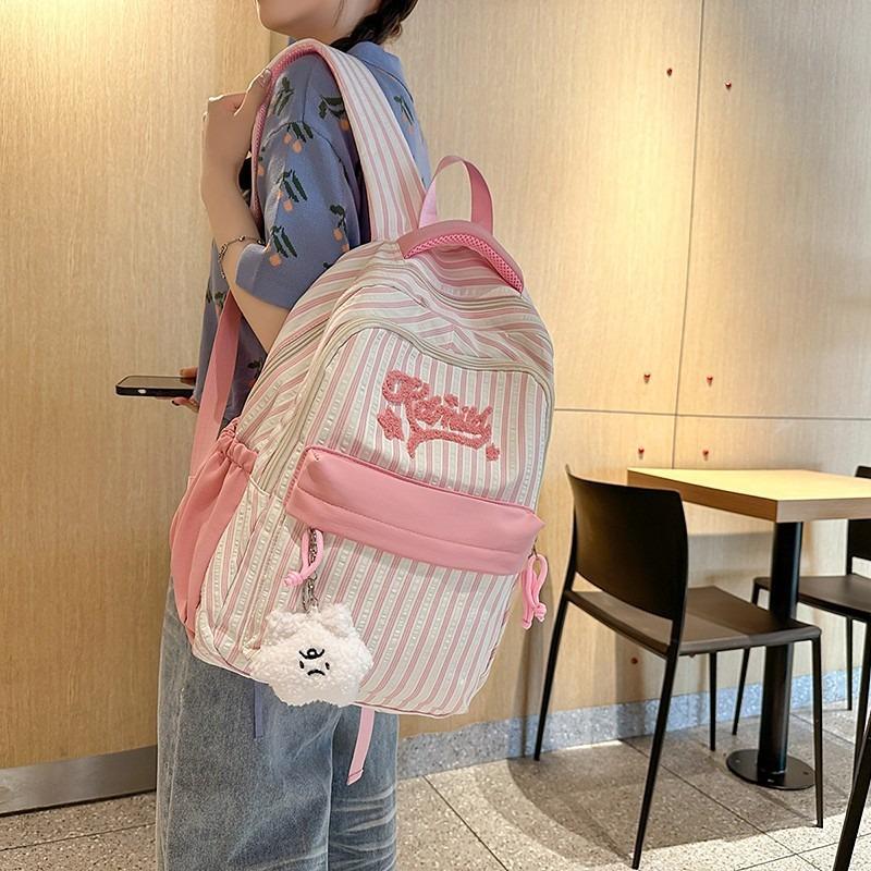 Striped backpack, large-capacity high school backpack, new lightweight schoolbag for junior high school students in the school season