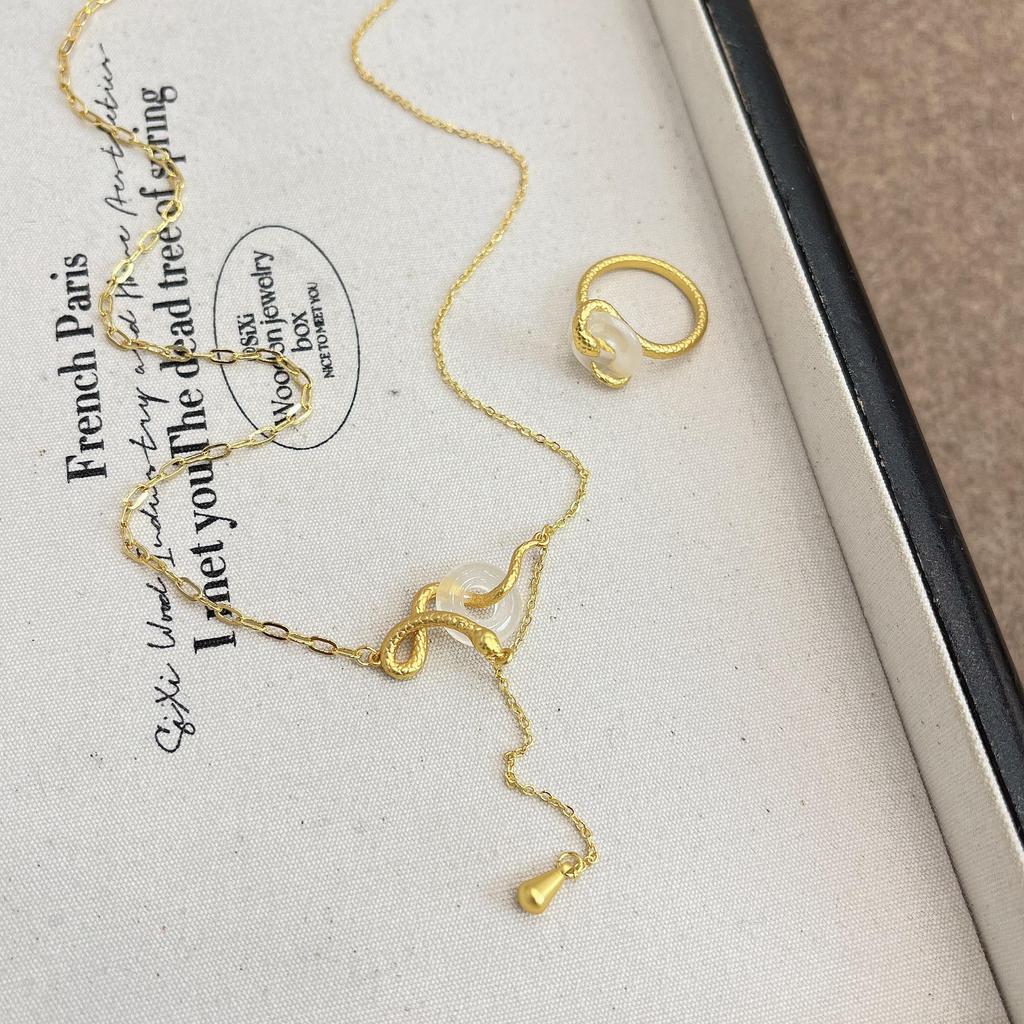 Silver Snake Peace Buckle Necklace: Elegant and Unique Zodiac-Inspired Clavicle Accessory for Women, Perfect for Autumn and Winter.